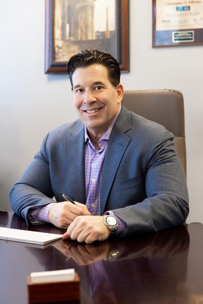 Chris Palermo, divorce attorney-mediator, at his desk