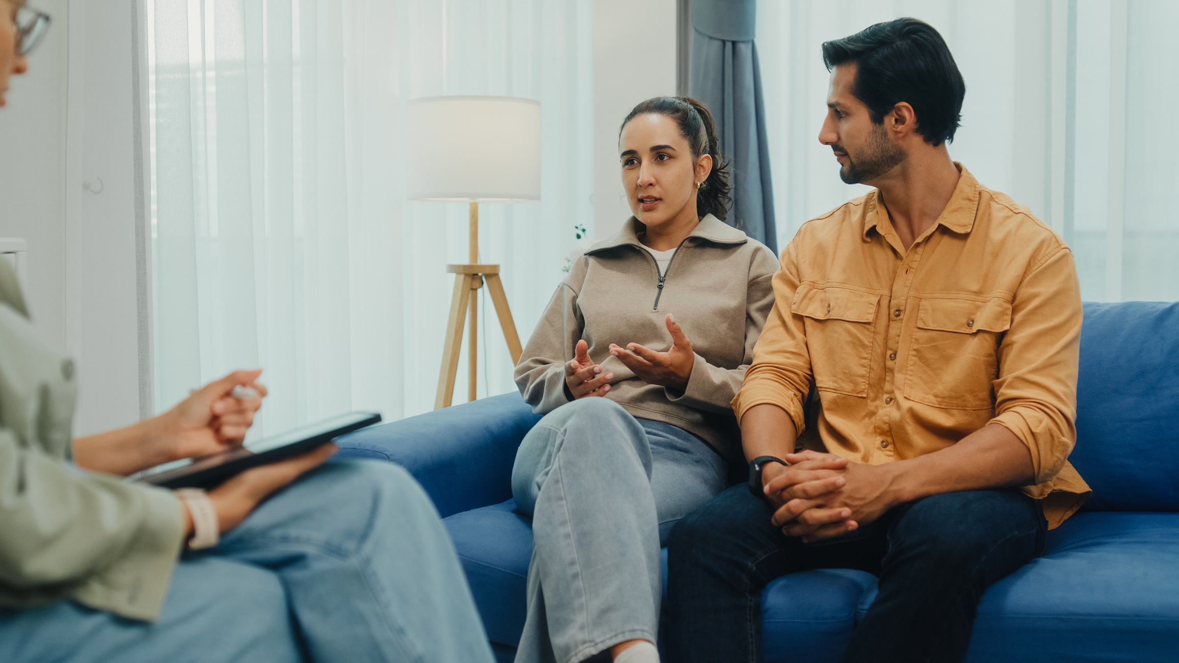 Young couple at a divorce mediator's office